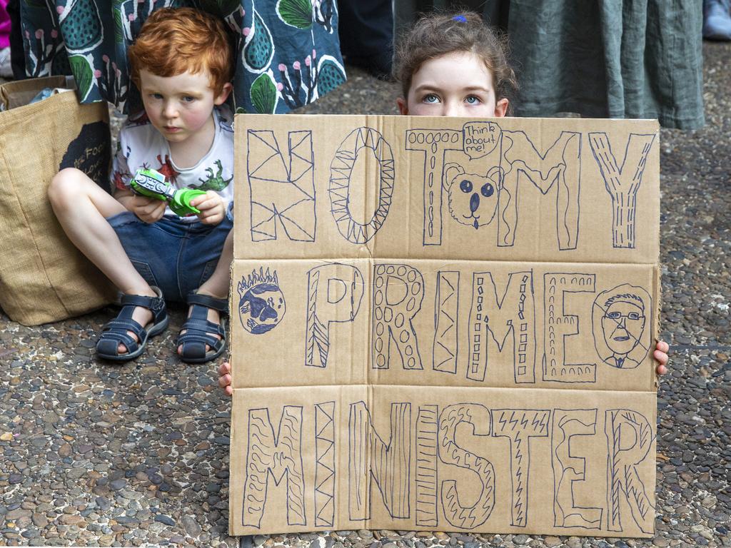 SYDNEY, AUSTRALIA - JANUARY 10: A child is seen holding a sign as activists rally for climate action at Sydney Town Hall on January 10, 2020 in Sydney, Australia. Protests around the country were organised in response to the ongoing bushfire crisis in Australia. Fires in New South Wales, Victoria, Queensland, Western Australia and South Australia have burned 8.4 million hectares of land. At least 25 people have been killed, including three volunteer firefighters, and thousands of homes and buildings have been destroyed. (Photo by Jenny Evans/Getty Images)