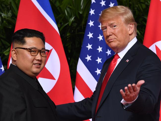 US President Donald Trump gestures as he meets with North Korea's leader Kim Jong-un. Picture: AFP