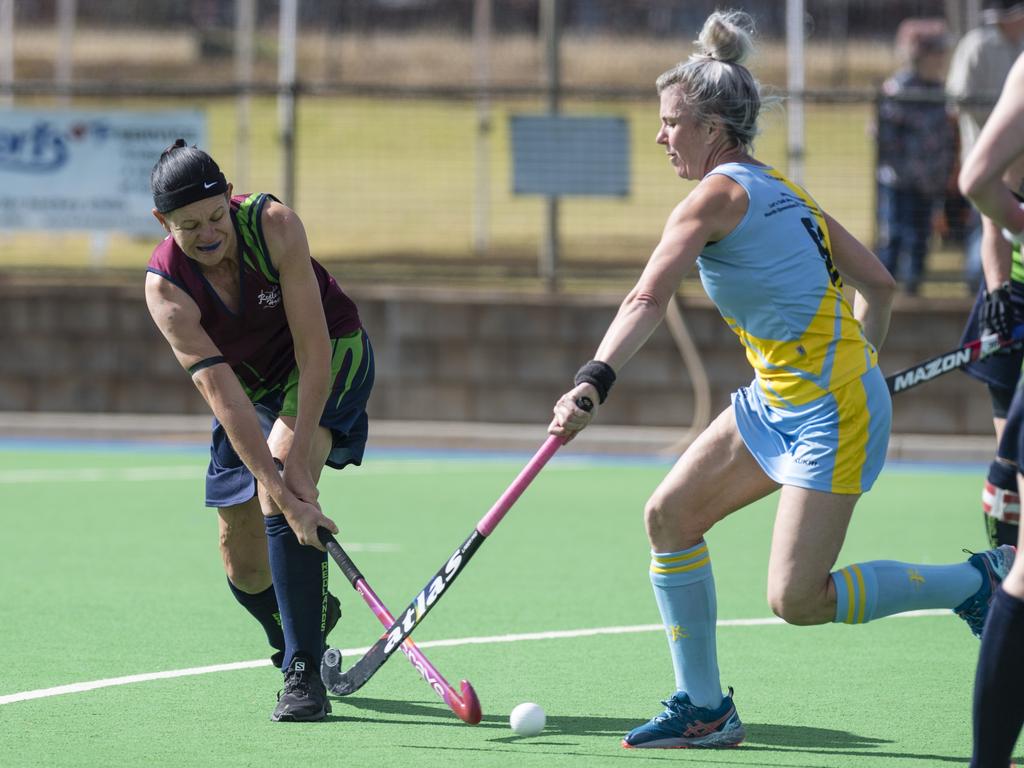 Tammy Drews (left) of Redlands 1 against Carliha Brown of Cairns 1.