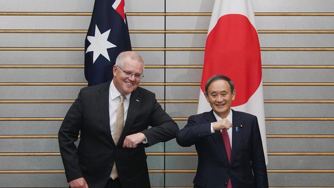 Scott Morrison and Yoshihide Suga meet in Tokyo in November last year. Picture: AFP