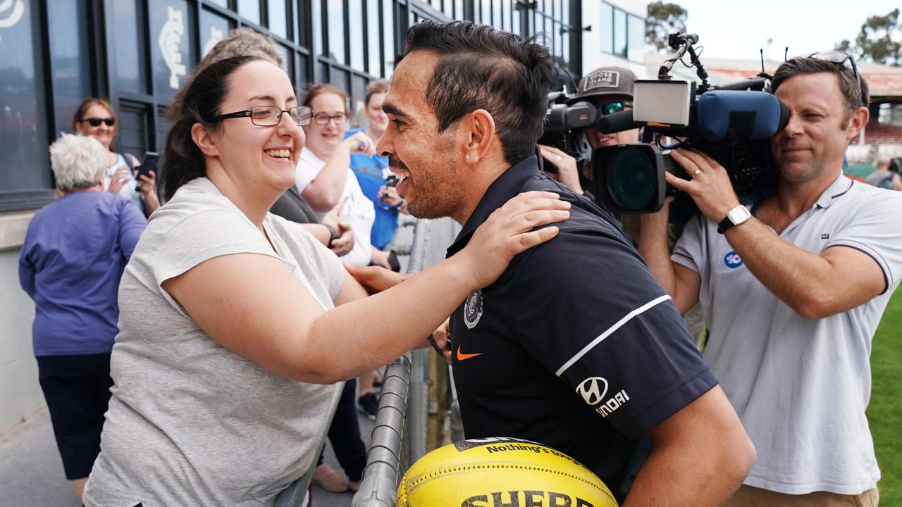 Eddie Betts was flanked by Carlton fans upon his return to the club. Picture: Michael Dodge