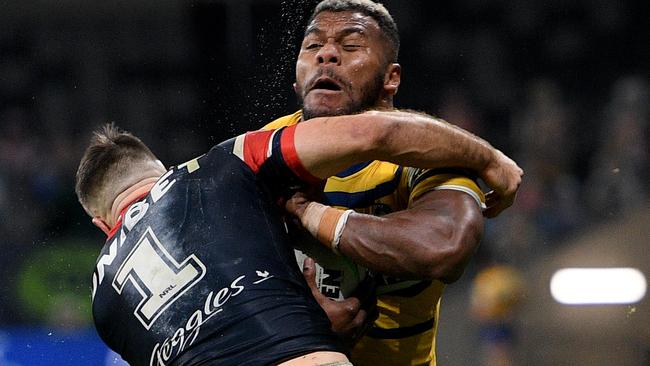 James Tedesco put his body on the line trying to stop Maika Sivo. Picture: Dan Himbrechts/AAP