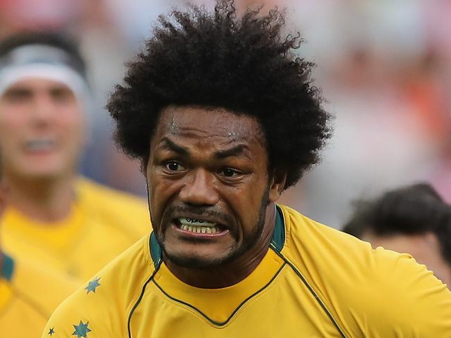 YOKOHAMA, JAPAN - NOVEMBER 04:  Henry Speight of Australia breaks through to score their second try during the rugby union  international match between Japan and Australia Wallabies at Nissan Stadium on November 4, 2017 in Yokohama, Kanagawa, Japan.  (Photo by David Rogers/Getty Images)