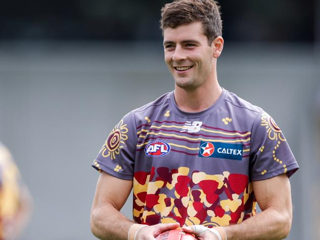 BRISBANE, AUSTRALIA - APRIL 23: Josh Dunkley of the Lions warms up during the 2023 AFL Round 07 match between the Brisbane Lions and the Fremantle Dockers at The Gabba on April 29, 2023 in Brisbane, Australia. (Photo by Russell Freeman/AFL Photos via Getty Images)