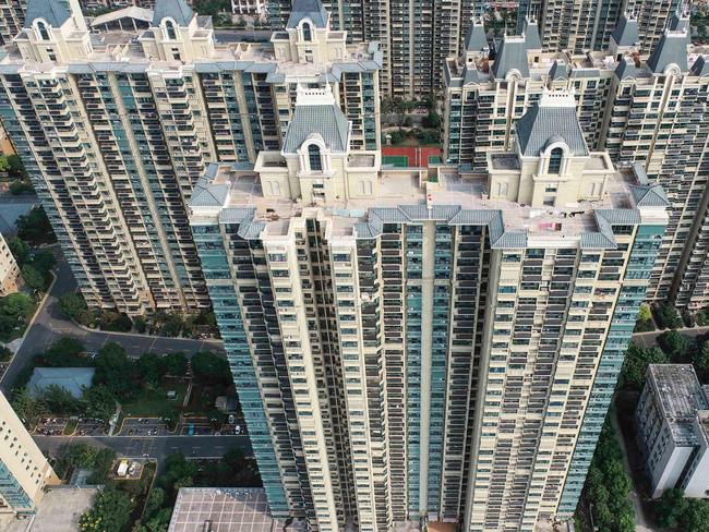 This aerial photo taken on September 17, 2021 shows a housing complex by Chinese property developer Evergrande in Huaian in China's eastern Jiangsu province. (Photo by STR / AFP) / China OUT