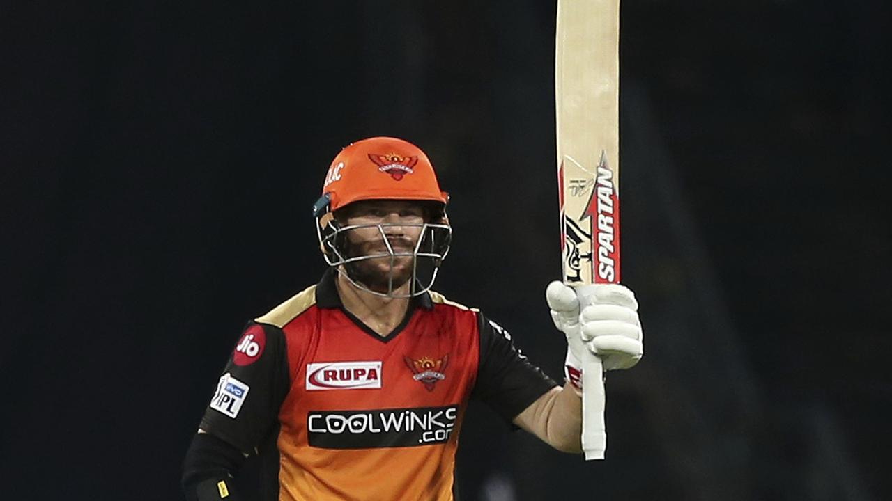 Sunrisers Hyderabad's David Warner raises his bat after scoring fifty