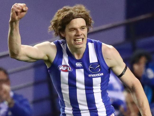 MELBOURNE, AUSTRALIA - AUGUST 12:  Ben Brown of the Kangaroos celebrates after kicking a goal during the round 21 AFL match between the North Melbourne Kangaroos and the Western Bulldogs at Etihad Stadium on August 12, 2018 in Melbourne, Australia.  (Photo by Scott Barbour/Getty Images)