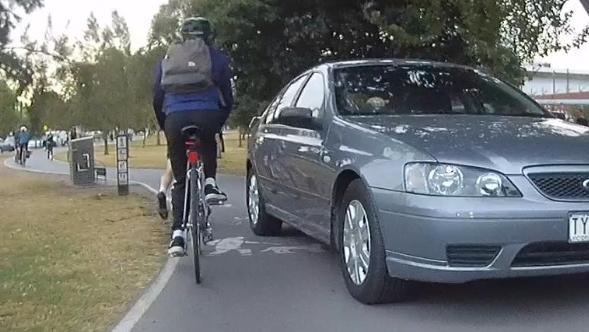 A car on the Capital City Trail, at the Lygon St crossing. Picture: @MelbrneCommuter