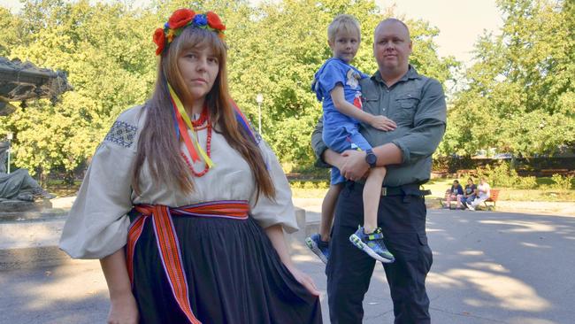 Iryna and Guy Bohlscheid with son Clyde, 5 in their home city of Launceston. Picture: Alison Foletta