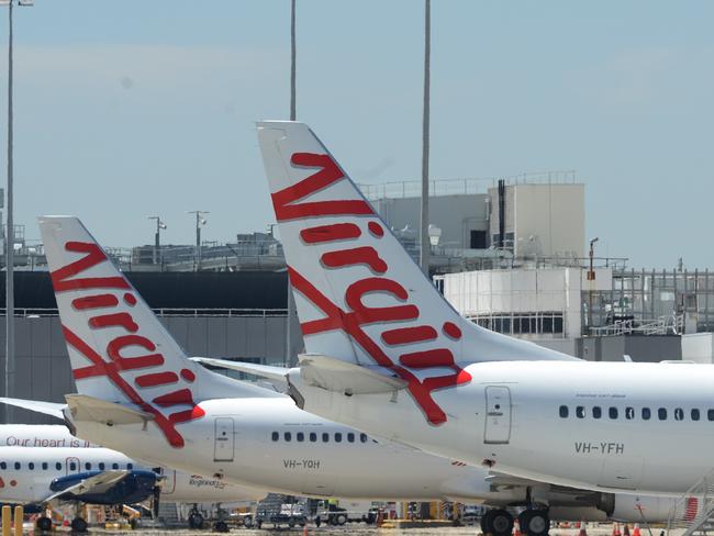 MELBOURNE, AUSTRALIA - NewsWire Photos NOVEMBER 22, 2021: Virgin planes parked at Melbourne Airport. Picture: NCA NewsWire / Andrew Henshaw