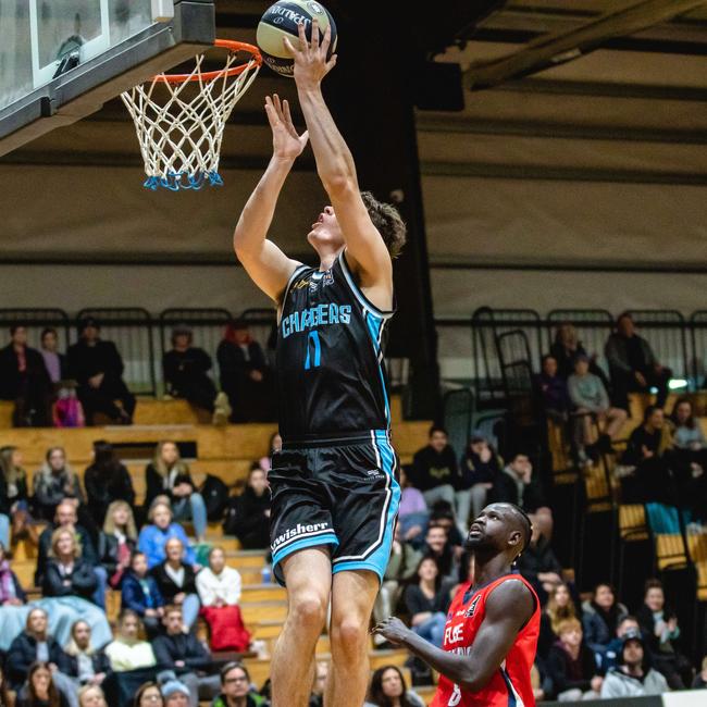 Jacob Richards scors an easy two points over Geelong’s Mawut Deng. Picture: Linda Higginson