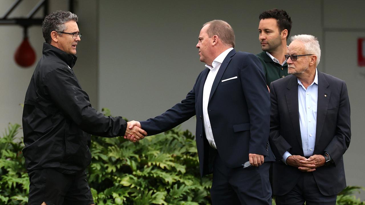 Leon Cameron greets Giants CEO Dave Matthews, alongside chairman Tony Shepherd and board director Jimmy Bartel. Picture: Phil Hillyard