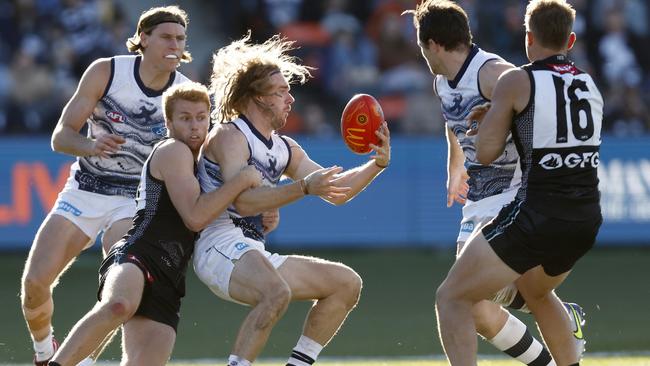 Willem Drew tackles Cat Cam Guthrie. Picture: Darrian Traynor/Getty Images