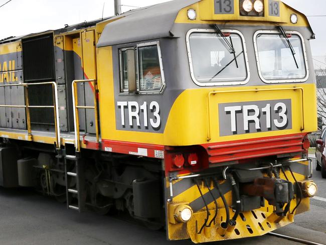 TasRail train passes through a rail crossing at Heybridge. PICTURE CHRIS KIDD