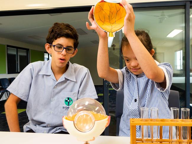 Year 7 students Giuseppe, 12, and Shari-Anne, 12, enjoying class at the school.