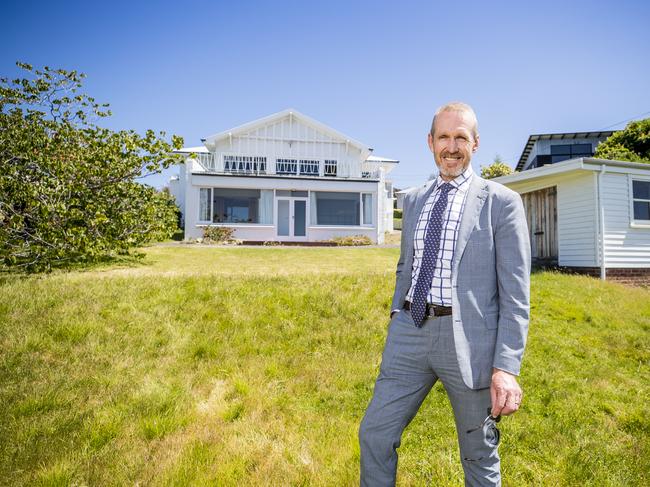 A Sandy Bay waterfront home on about 3000sq m of land has sold for $4.222 million. Charlotte Peterswald for Property director Kim Morgan. Picture: RICHARD JUPE