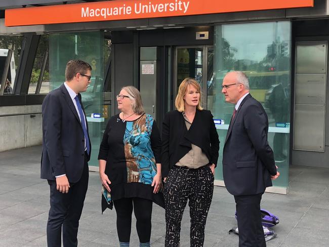 Ryde Mayor Jerome Laxale (left) and Opposition Leader Luke Foley (right) discussed the changes with Macquarie University worker Alison Barnes (second from right) and Elaine Talbert