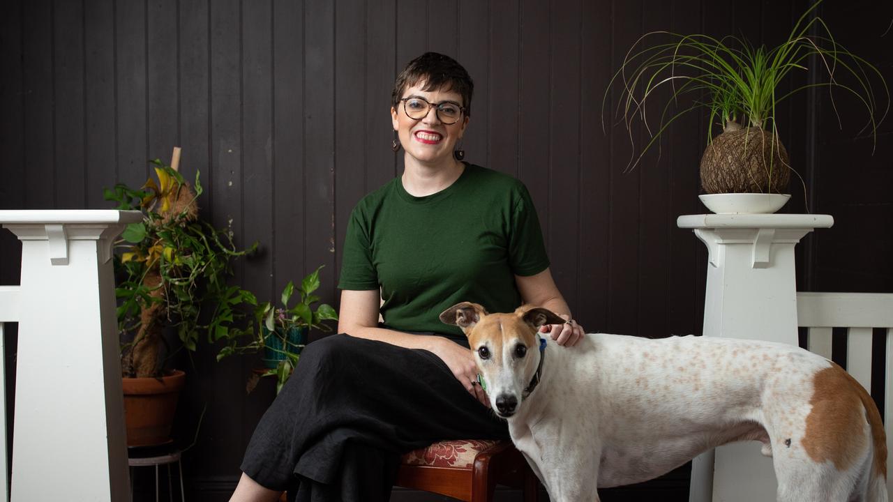 Greens MP Amy MacMahon who was seriously injured in a car crash in February this year, pictured with her dog Buddy. Photograph David Kelly