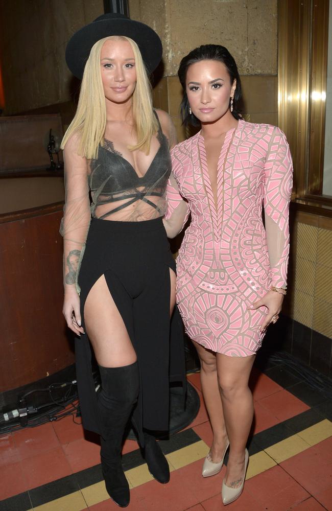 Iggy Azalea and Demi Lovato attend the Jeremy Scott and Adidas Originals 2015 VMA’s after party at Union Station in Los Angeles. Picture: Getty