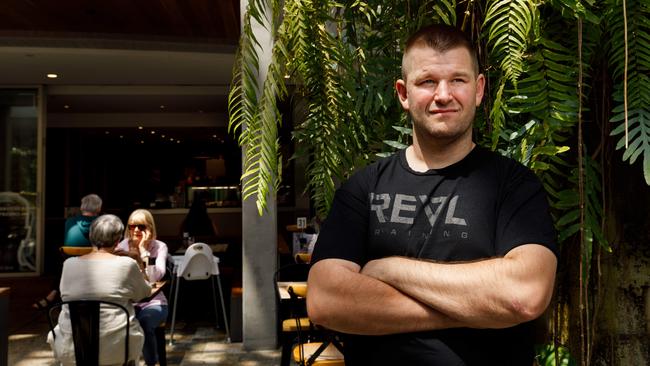 Mitchell Leach at his Four Brothers Espresso cafe, which entered into a small business restructuring (SBR) arrangement and was saved from bankruptcy. Picture: Max Mason-Hubers