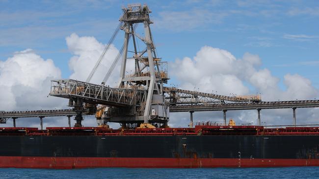 A coal ship docked at Abbot Point coal port in Bowen. We sell high-energy-producing coal to India and China where those nations manufacture steel to make goods to sell back to us. Picture: Lisa Maree Williams/Getty Images