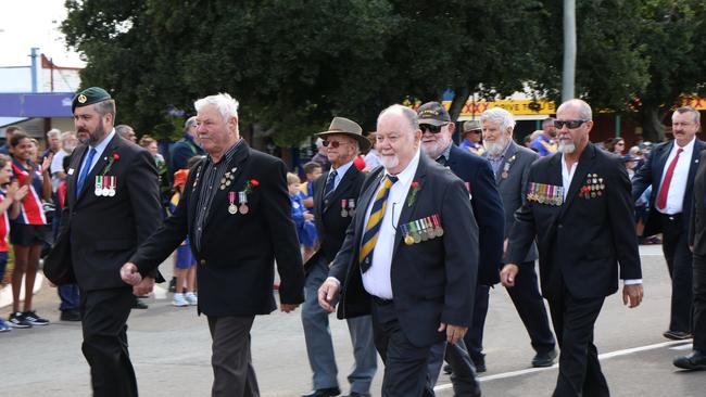 The crowd cheers the veterans on as they march proudly at the Murgon Anzac Day Service in 2022. Photo/Holly Cormack