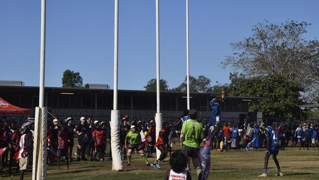 Dwayne Kerinauia with a mark on the goal line in the dying stages in the Tiwi Island Football League grand final between Tuyu Buffaloes and Pumarali Thunder. Picture: Max Hatzoglou