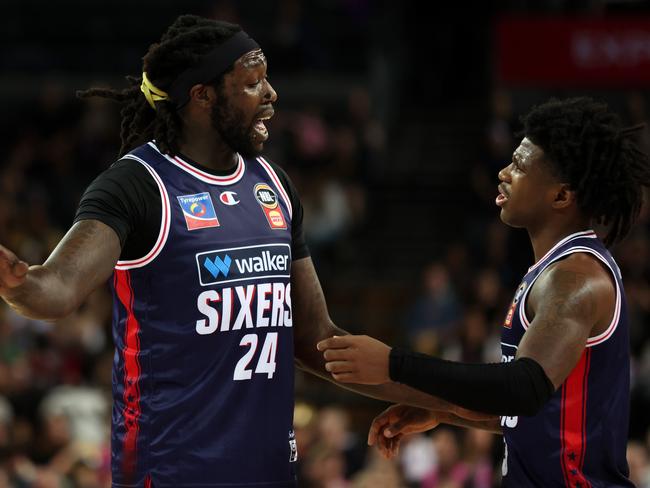 Montrezl Harrell (R) has a word with Adelaide teammate Kendric Davis. Picture: Getty