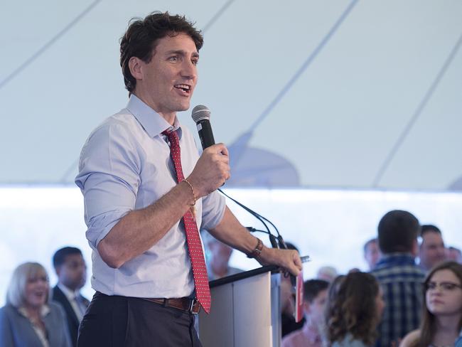 Canadian Prime Minister Justin Trudeau addresses the crowd at a Liberal fundraiser in Wolfville, Nova Scotia, Thursday, May 31, 2018. (Andrew Vaughan/The Canadian Press via AP)