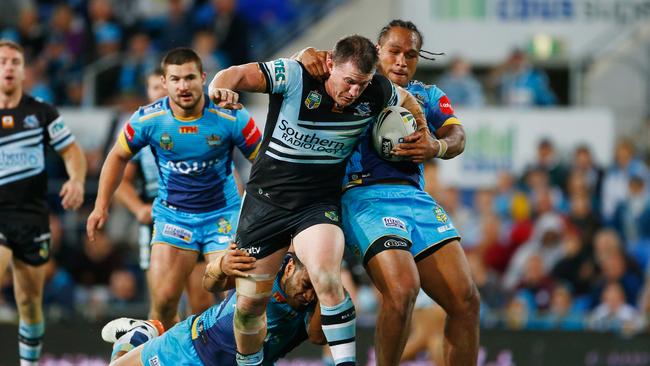 Paul Gallen on the charge for the Sharks against the Titans at Cbus Super Stadium.