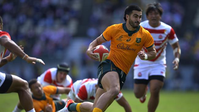 OITA, JAPAN - OCTOBER 23: Tom Wright of the Wallabies runs over to score a try during the rugby international test between Japan and Australia at Showa Denko Dome on October 23, 2021 in Oita, Japan. (Photo by Koki Nagahama/Getty Images)