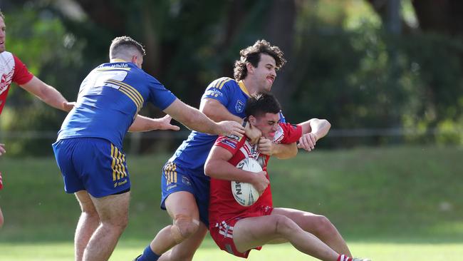 Toukley’s Ben Neville tackles Kincumber’s Jayden O’Sullivan at Darren Kennedy Oval on Sunday. Photo: Sue Graham