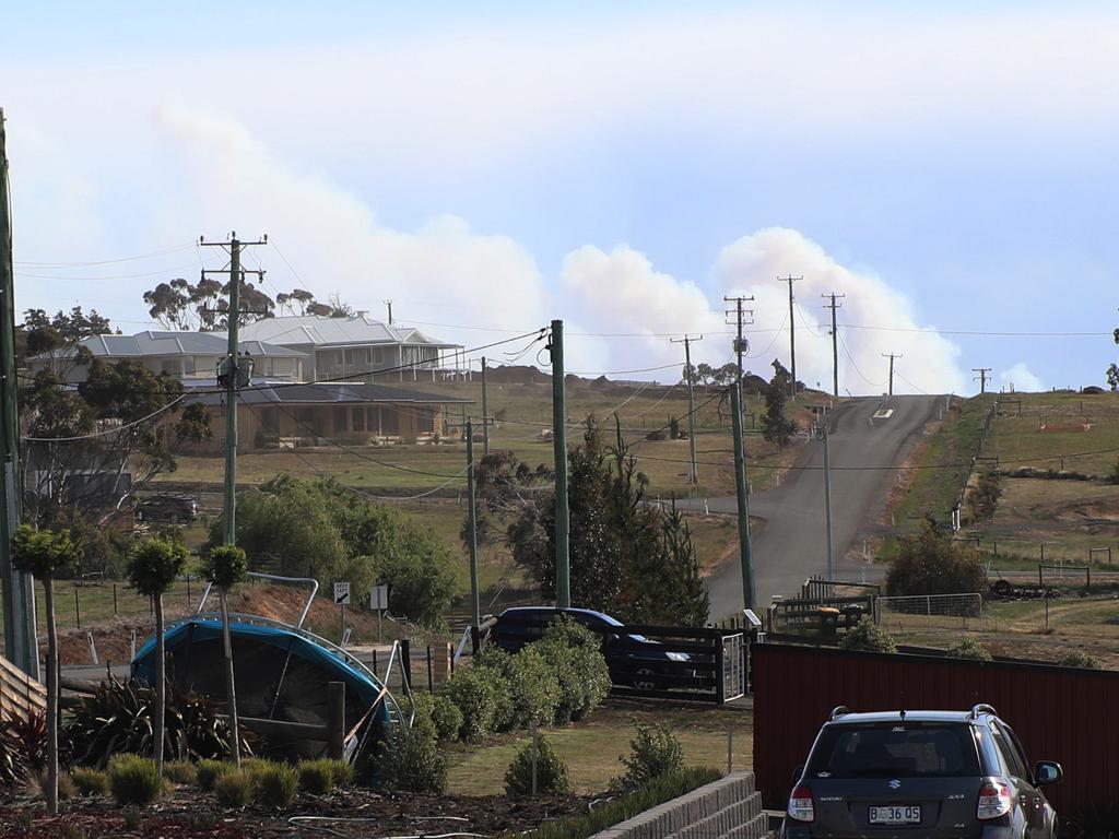 Smoke from the fire near Lachlan, as seen from Back Tea Tree Road, Tea Tree. Picture: LUKE BOWDEN