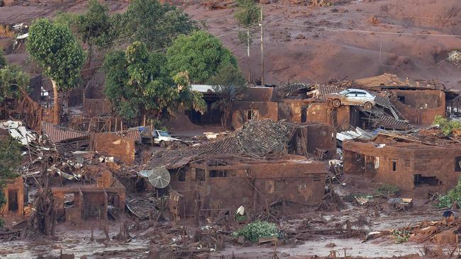 The collapse of a tailings dam at the Samarco iron ore mine in Brazil last November killed 19 people and polluted a huge swath of the river basin. (AFP PHOTO/Douglas Magno)