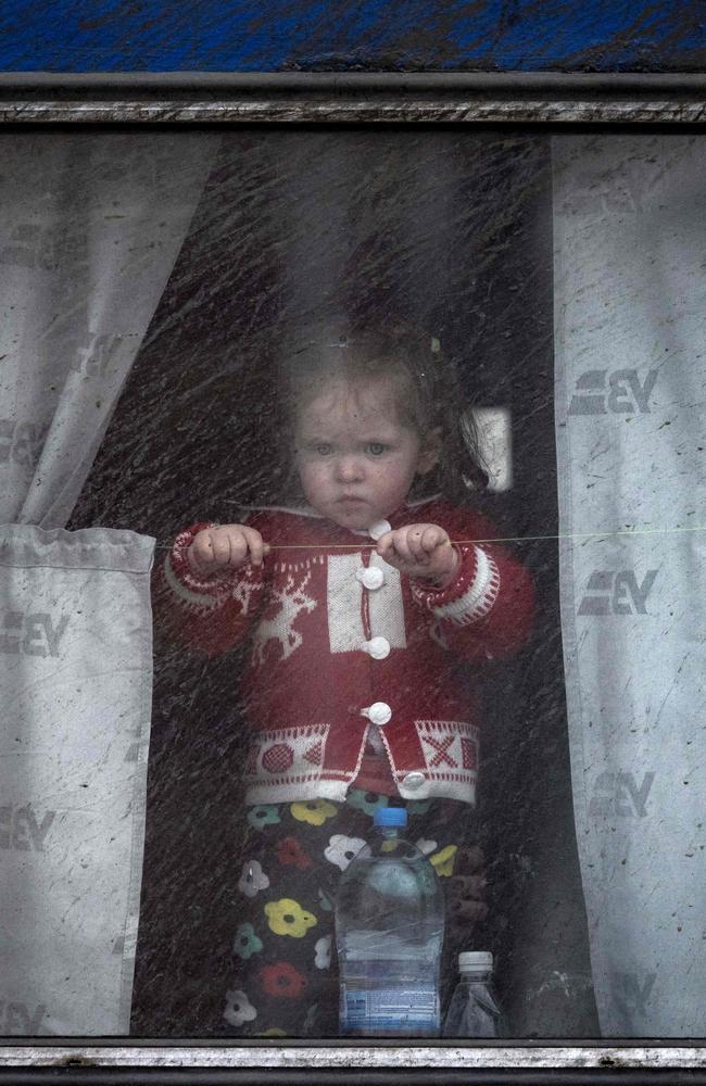 A child appears at the window of train at Kramatorsk central station as families flee the eastern city of Kramatorsk, in the Donbass region on April 4, 2022. Picture: Fadel Senna/AFP