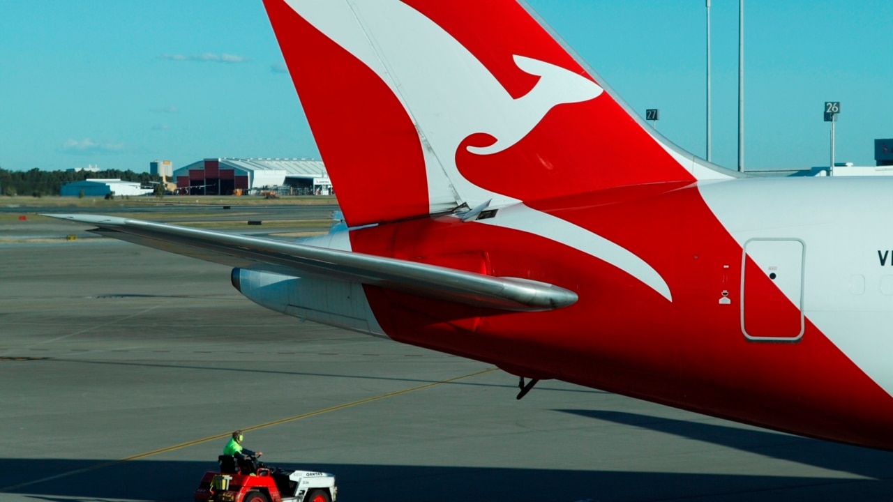 Qantas posts first half loss of $1 billion