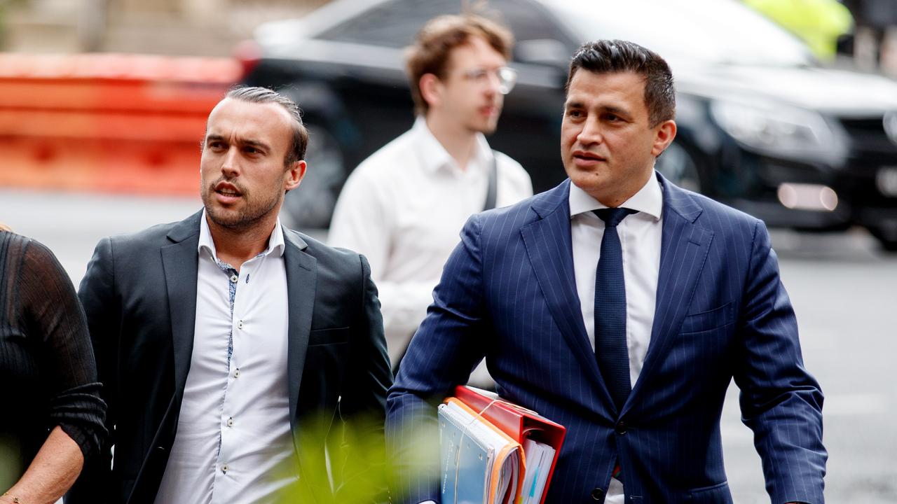 A-League star Clayton Rhys Lewis (left), with lawyer Zemarai Khatiz, was denied an application to return to his native New Zealand. Picture: NewsWire / Nikki Short