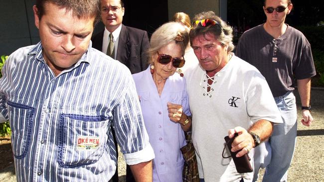 2002: Joy Ellen Thomas, alleged Arnotts extortionist, walks free from Brisbanes Supreme Court, with family and legal members after her case was struck out due to DNA evidence concerns. Picture: Lyndon Mechielsen.