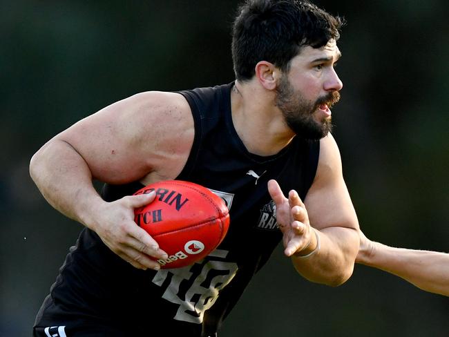 Matthew Mariani of East Burwood is tackled during the round nine EFNL Division 2 Eastland Senior Mens match between East Burwood and Lilydale at East Burwood Reserve, on June 01, 2024, in Melbourne, Australia. (Photo by Josh Chadwick)