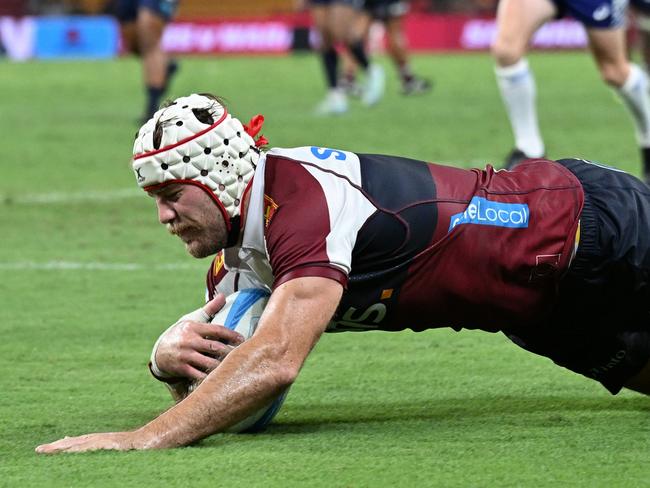 Fraser McReight scores a try for the Reds. Picture: Getty Images