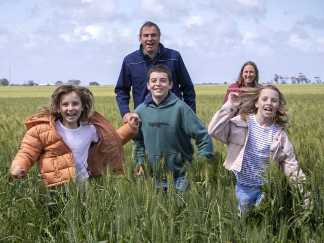 ADELAIDE, AUSTRALIA - Advertiser Photos OCTOBER 14, 2022: South Australian grain farmers Bradley and Colleen Lowe with kids Ethan 12yrs, Macy 10yrs and Josie 8yrs among the wheat crops at Wasleys, SA. Picture Emma Brasier