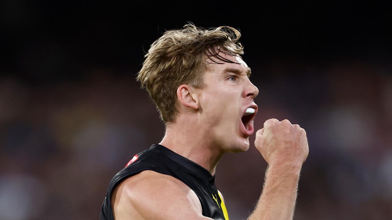 MELBOURNE, AUSTRALIA - MARCH 14: Tom Lynch of the Tigers celebrates a goal during the 2024 AFL Round 01 match between the Carlton Blues and the Richmond Tigers at the Melbourne Cricket Ground on March 14, 2024 in Melbourne, Australia. (Photo by Michael Willson/AFL Photos via Getty Images)