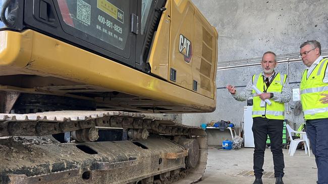 Federal Agriculture Minister Murray Watt (right) inspecting a highly contaminated digger imported from China on 26 April, 2023, in Brisbane. Picture: Supplied