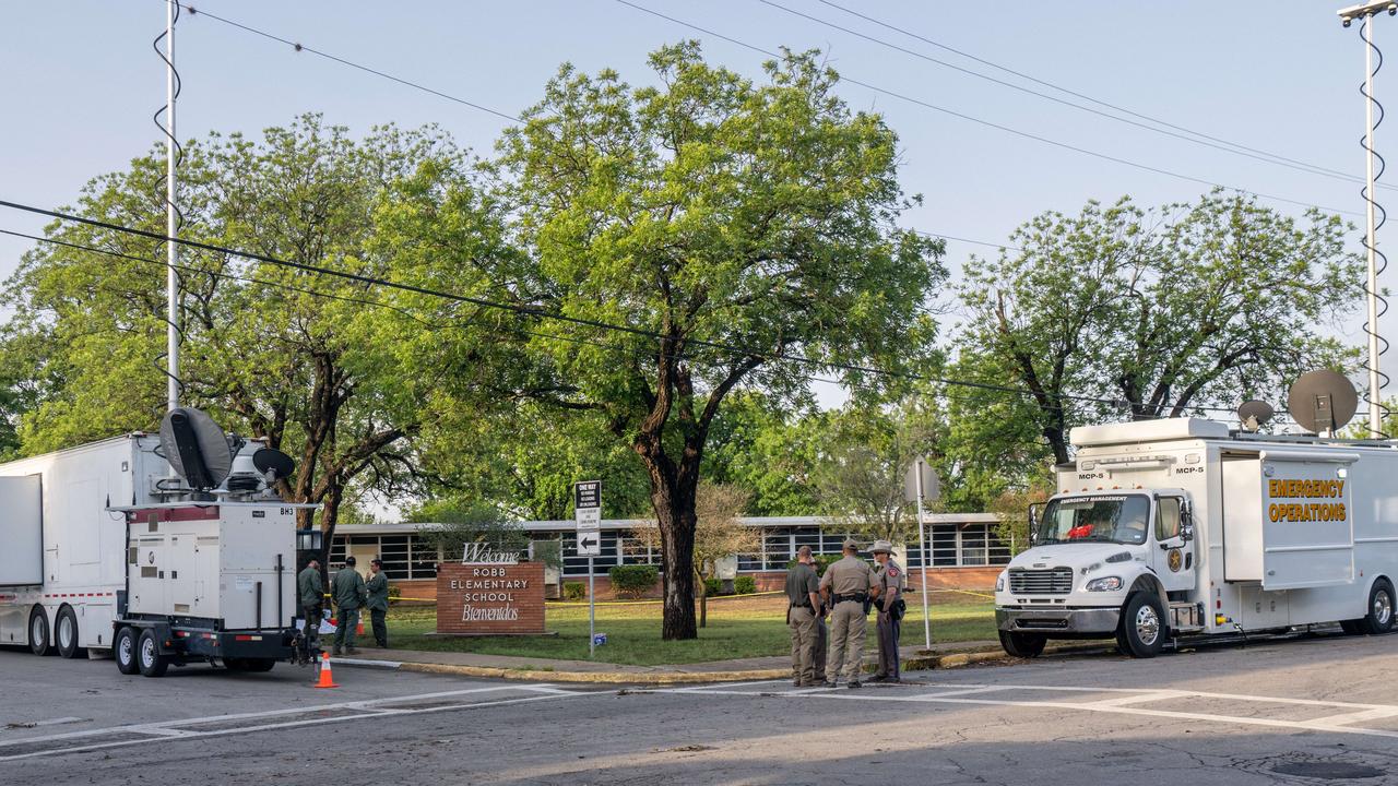 Authorities gather outside Robb Elementary School following the mass shooting. Picture: Brandon Bell/Getty Images/AFP