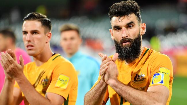 Mile Jedinak (right) looks set to return for the Socceroos. Picture: Getty Images