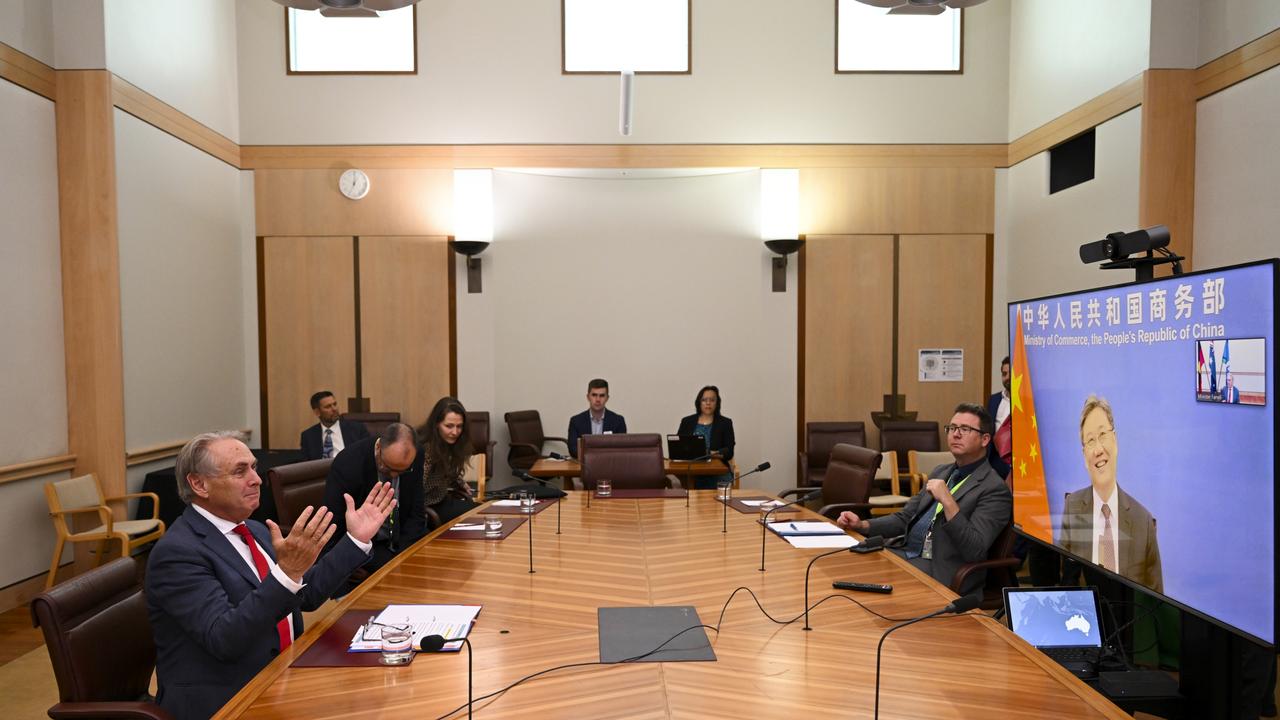 Trade Minister Don Farrell speaks with his counterpart Wang Wentao during a meeting via teleconference at Parliament House in Canberra. Picture: NCA NewsWire / POOL / Lukas Coch