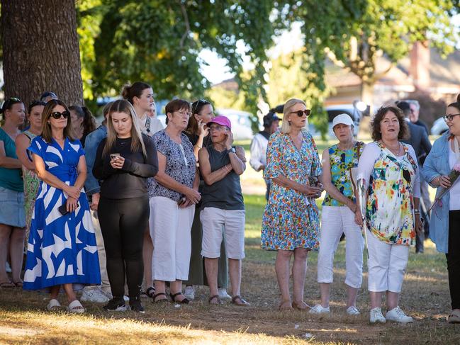 People queue to write a message for Samantha. Picture: Mark Stewart