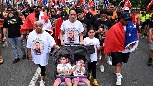 The family of deceased Cross River Rail Worker Daniel Sa’•u, his wife Geraldine and daughters Clover and Thira, taking part in a CFMEU• union rally in Brisbane. Picture: Dan Peled / NCA NewsWire