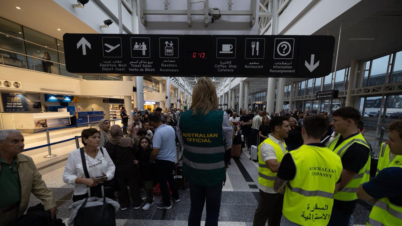 Australian Government officials assisting Australians to depart Lebanon on two government-supported charter flights from Beirut Airport to Larnaca, Cyprus and on to Australia. Picture: NewsWire Handout