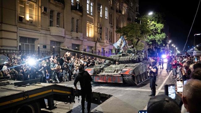 Members of Wagner Group prepare to pull out from the headquarters of the Southern Military District to return to their base in Rostov-on-Don late on Saturday. Picture: AFP